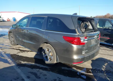 2018 Honda Odyssey Touring z USA, uszkodzony, nr VIN 5FNRL6H85JB076120